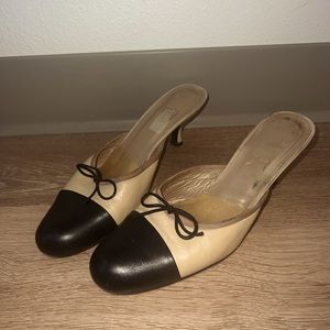 Stuart Weitzman tan and black with bow kitten heels. Chanel inspired